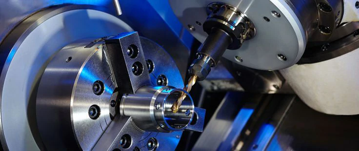 High-precision CNC machine tool processing a metal part, showcasing intricate machining processes and precision tools.