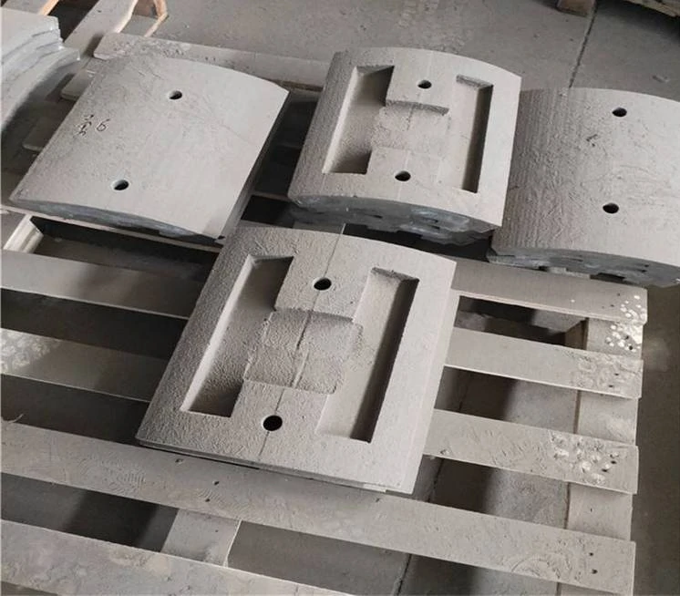 High-chromium alloy cast iron wear parts and crusher hammers, heat-treated for HRC60+ hardness to resist abrasive ore erosion.