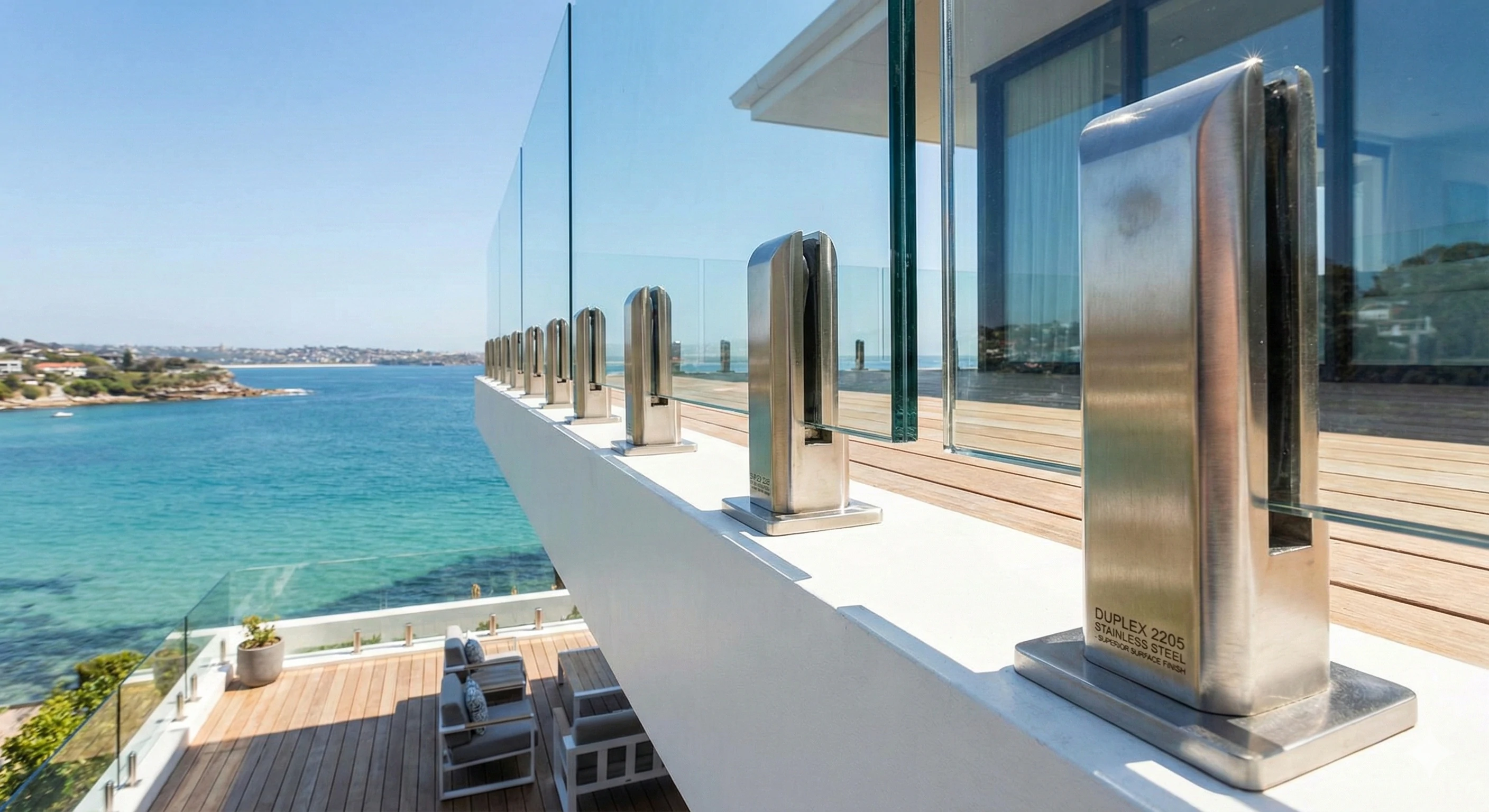 Stainless steel glass spigots supporting frameless balcony glass railing system